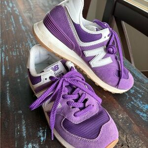 New Balance.  Women’s size 5.5.
